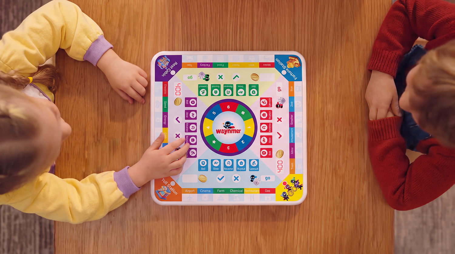 Top-down view of the Waynmer City Trader board during a match